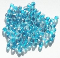 100 4mm Faceted Crystal, Aqua, & Montana Firepolish Beads
